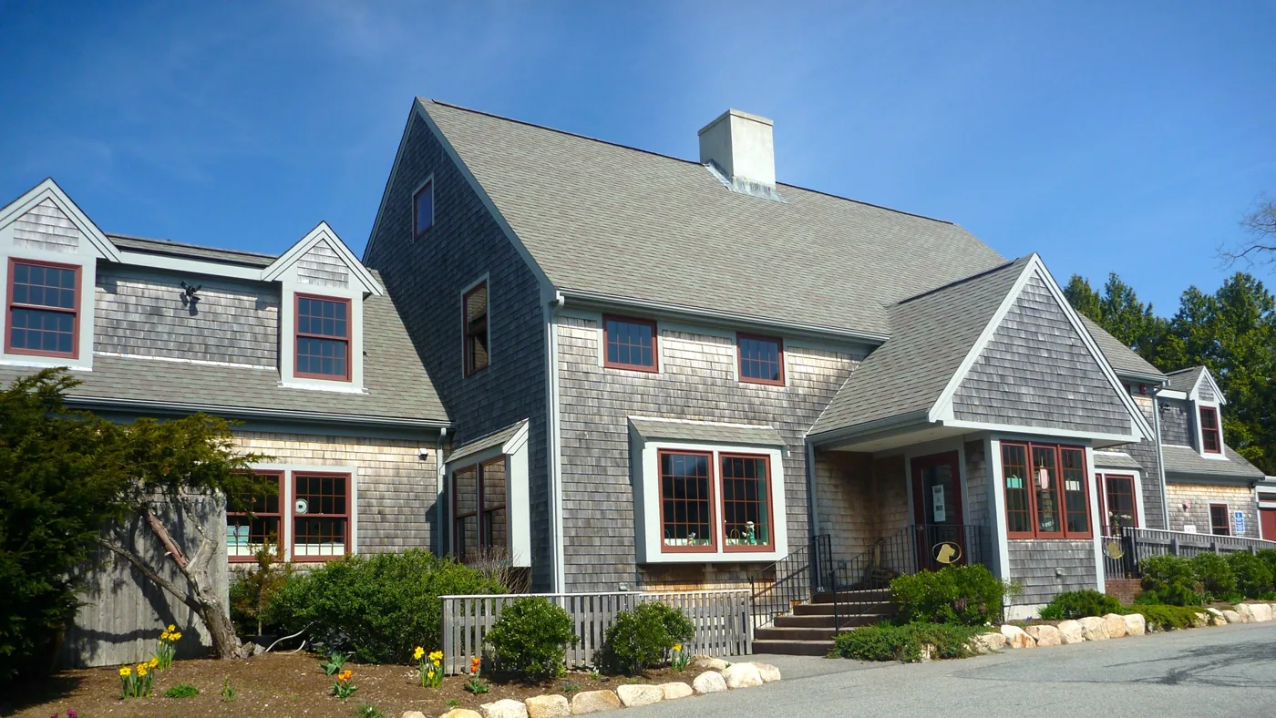 The shingled Cape Cod Animal Hospital building and front entrance